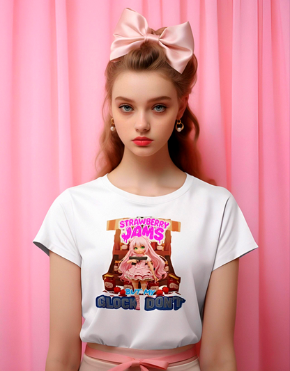 Anime-style girl with pink hair and a frilly pink dress holds a black Glock pistol in front of a market stall with jars labeled "Jam." Above her is the text "STRAWBERRY JAMS" in a dripping red font, and below is "BUT MY GLOCK DON'T" in a contrasting blue and white outlined font.