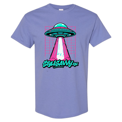 A vibrant Violet t-shirt featuring a retro-style illustration of a flying saucer with a bright pink and teal beam extending downwards towards the "Stylesavvy" logo in a stylized script font.